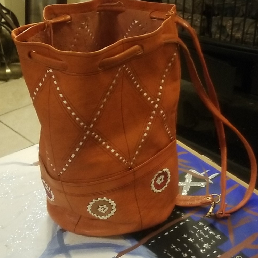 10x13 rust orange with back pack